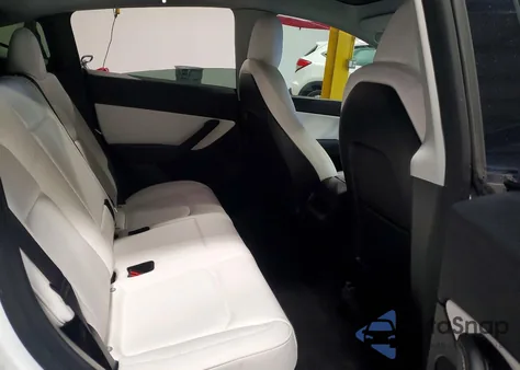 2022 Tesla Model Y from USA, damaged, VIN 7SAYGDEE0NF322191